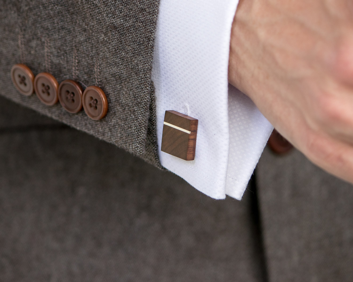 Walnut & Sterling Silver Cufflinks being worn with a suit